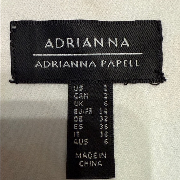 Adrianna Papell Floral V-Neck Romper with Belt
#AD3D105394 - Picture 8 of 12